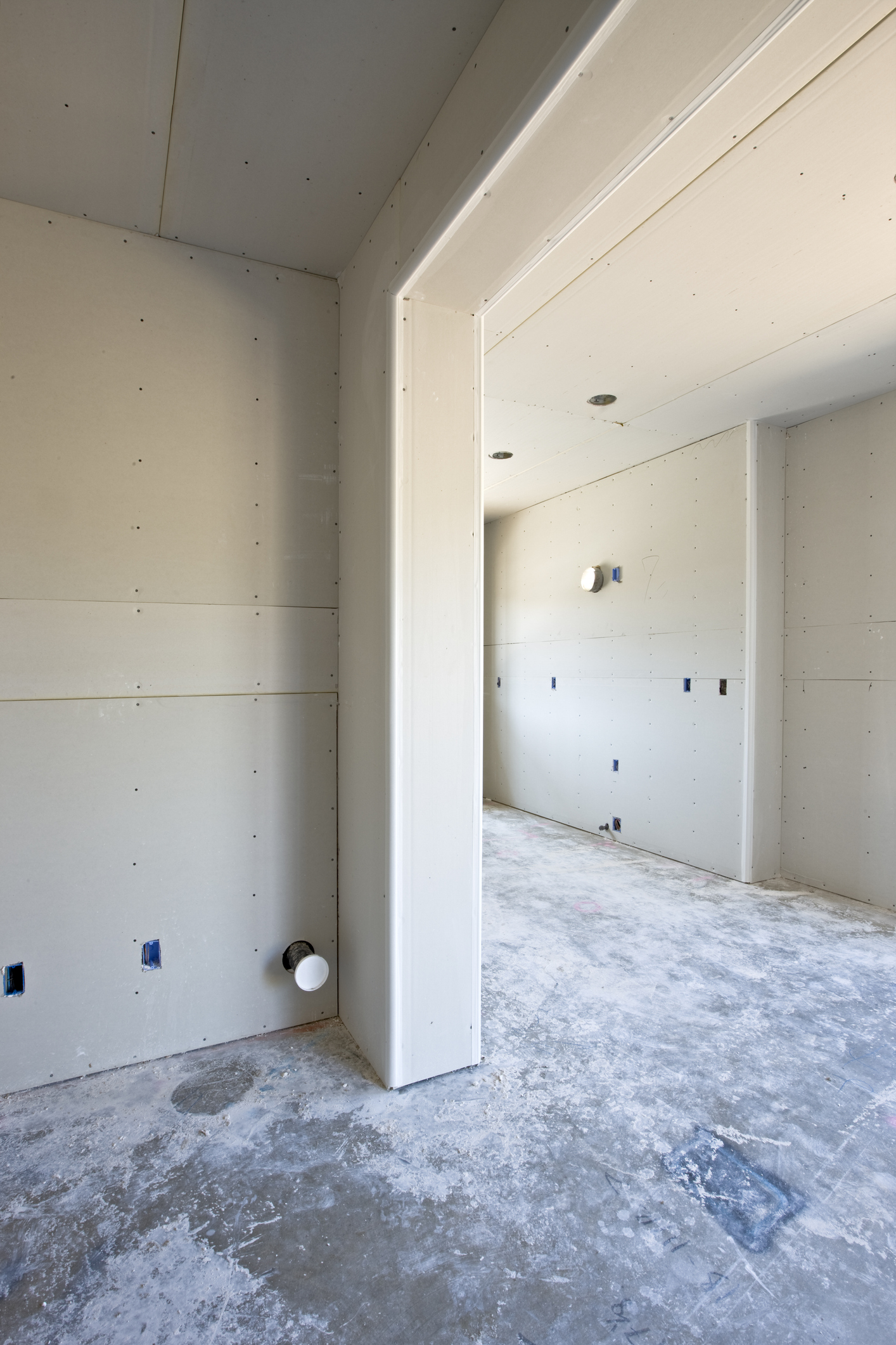 New drywall plasterboard construction of an interior space. Detail of drywall under construction. High resolution file shot on a Canon 1Ds Mark III.